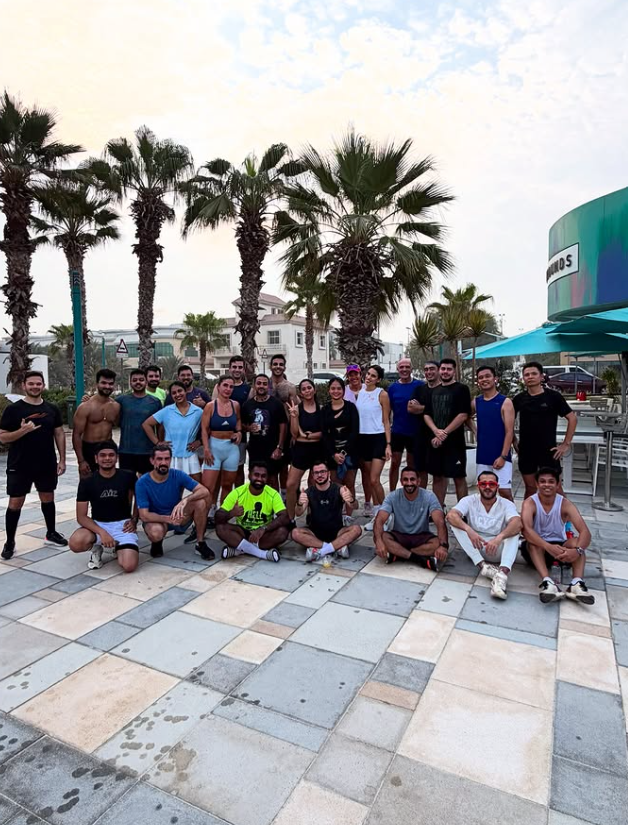 Large Croissant Run Club group posing after a community run